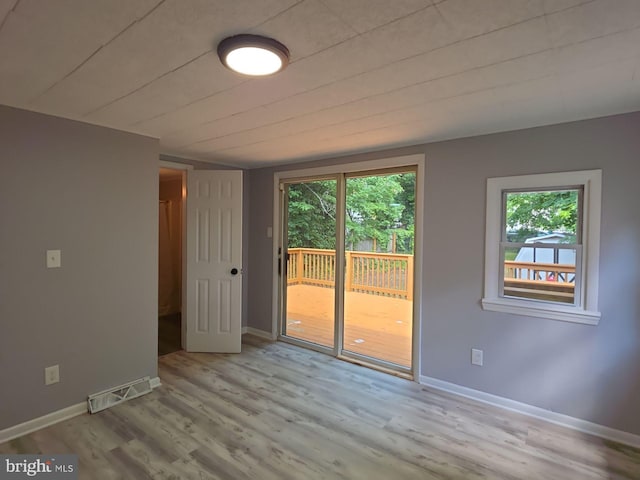131 Vine St, Bridgeton, NJ 08302 - empty room featuring wood finished floors and baseboards