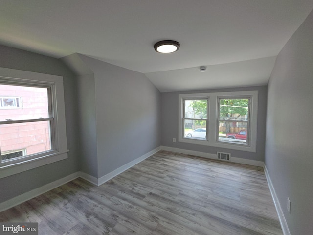 131 Vine St, Bridgeton, NJ 08302 - empty room featuring lofted ceiling, wood finished floors, and baseboards