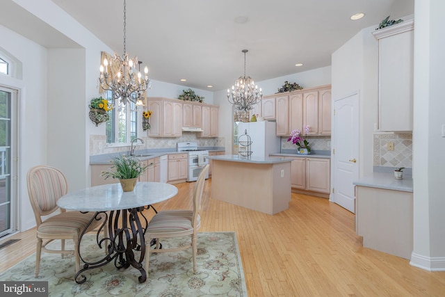 144 Cedar Ct, Woolwich Twp, NJ 08085 - kitchen with white appliances, a chandelier, light brown cabinetry, backsplash, and recessed lighting