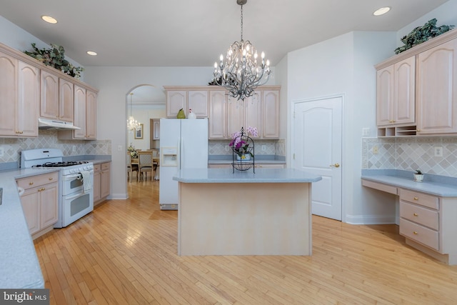 144 Cedar Ct, Woolwich Twp, NJ 08085 - kitchen with white appliances, under cabinet range hood, backsplash, and recessed lighting