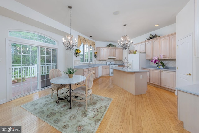 144 Cedar Ct, Woolwich Twp, NJ 08085 - dining space with a chandelier, light wood finished floors, and recessed lighting
