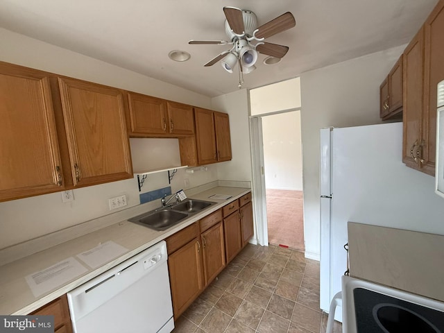 87 Courtyard Dr, Carlisle, PA 17013 - kitchen with white appliances, a sink, and brown cabinets