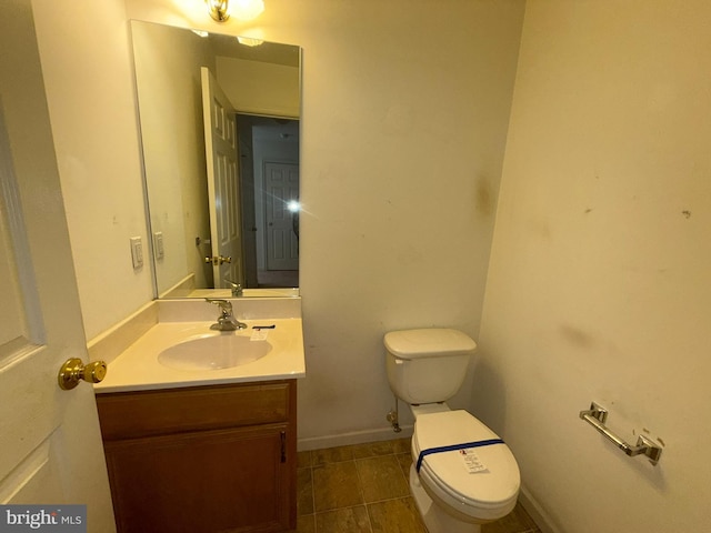 87 Courtyard Dr, Carlisle, PA 17013 - half bathroom with toilet, vanity, and baseboards