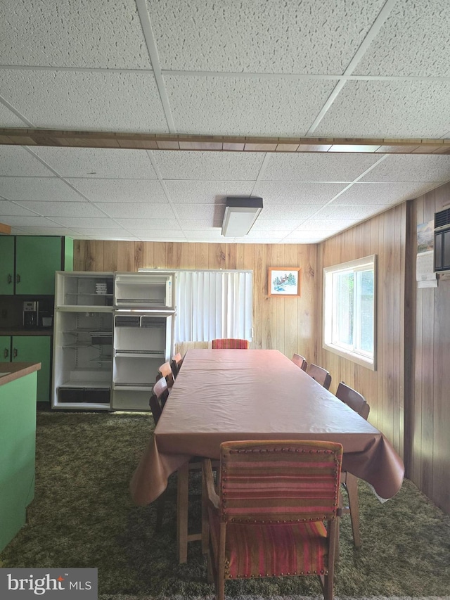 11 Maxwill Ln, Landisburg, PA 17040 - dining space with carpet floors, wood walls, and a paneled ceiling