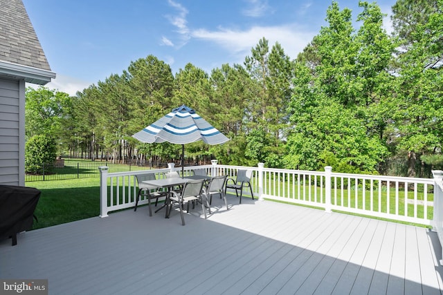 35206 Seagrass Plantation Ln, Dagsboro, DE 19939 - deck with outdoor dining area and view of scattered trees