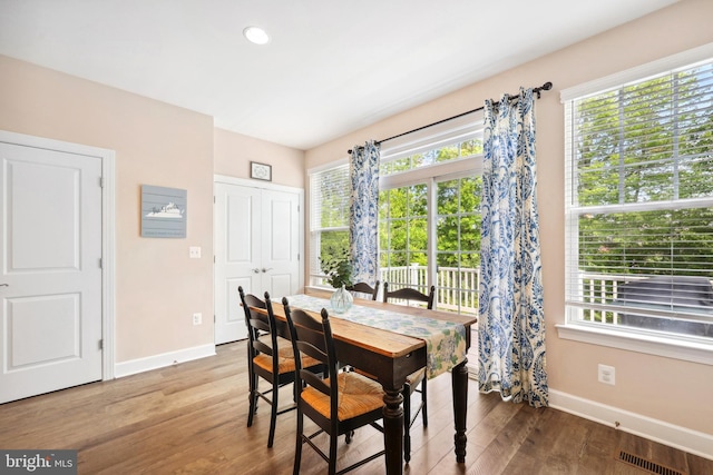 10744 Hinton Way, Manassas, VA 20112 - dining room featuring baseboards, wood finished floors, and recessed lighting
