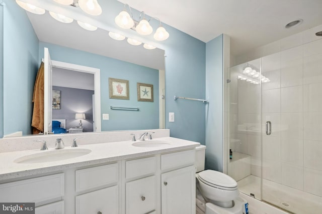10744 Hinton Way, Manassas, VA 20112 - bathroom with connected bathroom, double vanity, a stall shower, and toilet
