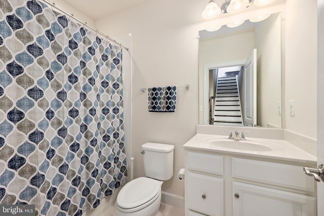 10744 Hinton Way, Manassas, VA 20112 - bathroom with vanity, toilet, curtained shower, and baseboards