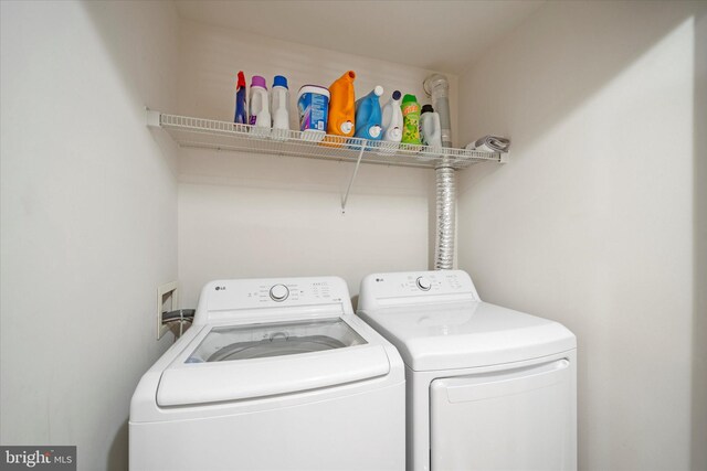 6124 Aster Haven Cir, Haymarket, VA 20169 - washroom with separate washer and dryer