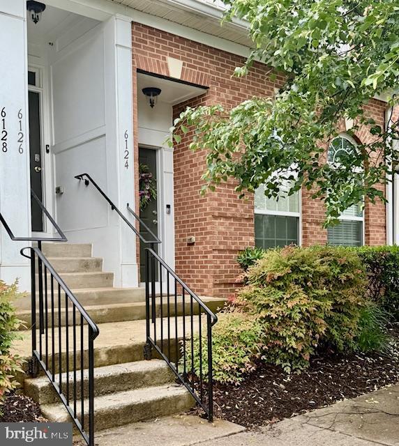 6124 Aster Haven Cir, Haymarket, VA 20169 - property entrance with brick siding