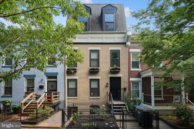158 Bryant St NW Unit 2, Washington, DC 20001 - multi unit property with mansard roof, brick siding, a fenced front yard, a gate, and roof with shingles