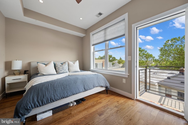 158 Bryant St NW Unit 2, Washington, DC 20001 - bedroom with access to exterior, baseboards, wood finished floors, and recessed lighting
