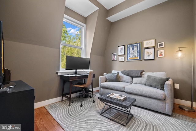 158 Bryant St NW Unit 2, Washington, DC 20001 - living room featuring wood finished floors, an office area, and baseboards