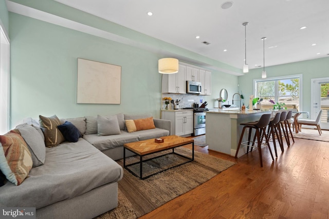 158 Bryant St NW Unit 2, Washington, DC 20001 - living area featuring light wood-style flooring and recessed lighting