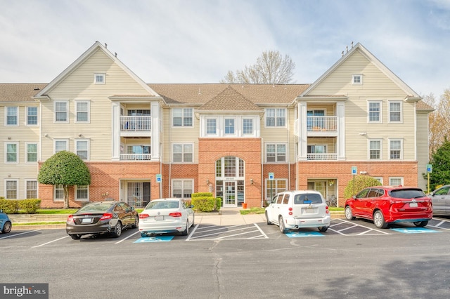 1310 Sheridan Pl Unit 108-17, Bel Air, MD 21015 - view of building exterior featuring uncovered parking