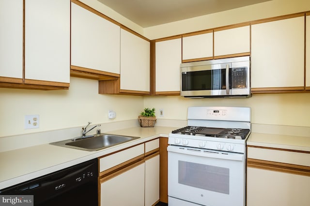 1310 Sheridan Pl Unit 108-17, Bel Air, MD 21015 - kitchen featuring gas range gas stove, stainless steel microwave, dishwasher, a sink, and light countertops