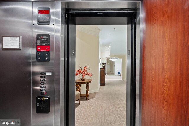 913A Caroline St, Fredericksburg, VA 22401 - elevator featuring carpet floors, baseboards, and crown molding