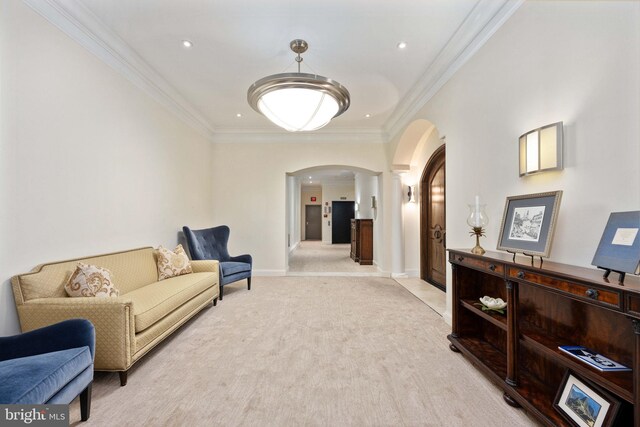 913A Caroline St, Fredericksburg, VA 22401 - living area with arched walkways, light colored carpet, crown molding, decorative columns, and baseboards