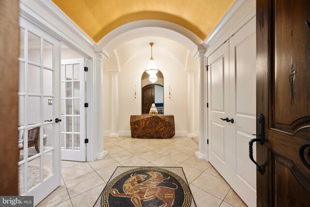 913A Caroline St, Fredericksburg, VA 22401 - entrance foyer featuring ornate columns, arched walkways, light tile patterned flooring, french doors, and vaulted ceiling