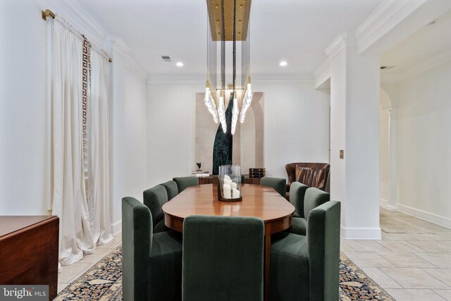 913A Caroline St, Fredericksburg, VA 22401 - dining space with arched walkways, ornate columns, ornamental molding, baseboards, and recessed lighting