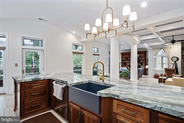 913A Caroline St, Fredericksburg, VA 22401 - kitchen featuring dishwashing machine, a sink, open floor plan, light stone counters, and recessed lighting