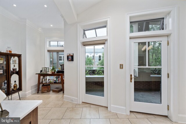 913A Caroline St, Fredericksburg, VA 22401 - doorway featuring light tile patterned flooring, baseboards, recessed lighting, ornamental molding, and a high ceiling