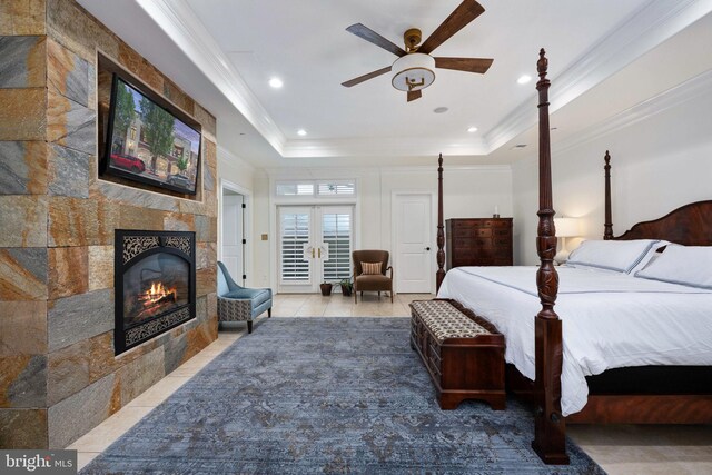 913A Caroline St, Fredericksburg, VA 22401 - tiled bedroom featuring a fireplace, a tray ceiling, crown molding, and recessed lighting