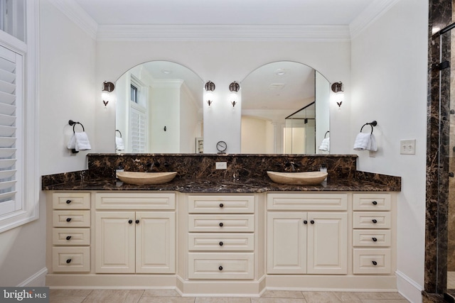 913A Caroline St, Fredericksburg, VA 22401 - bathroom featuring double vanity, ornamental molding, a shower, and baseboards
