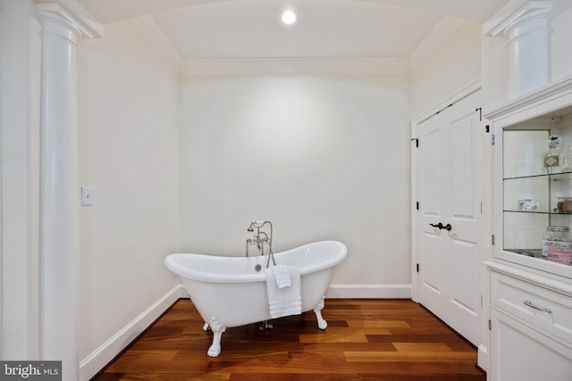 913A Caroline St, Fredericksburg, VA 22401 - full bath with a freestanding bath, crown molding, wood finished floors, decorative columns, and baseboards