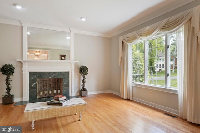 2 Turnberry Way, New Hope, PA 18938 - living room with crown molding, wood finished floors, baseboards, and a fireplace