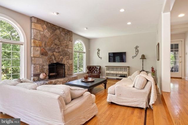 2 Turnberry Way, New Hope, PA 18938 - living room featuring wood finished floors, a stone fireplace, and recessed lighting