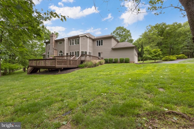2 Turnberry Way, New Hope, PA 18938 - rear view of property with a chimney, a deck, and a lawn