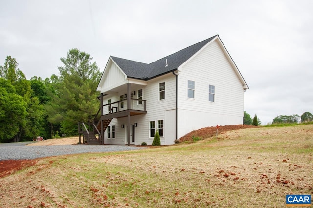 205 League Ln, Lovingston, VA 22949 - view of home's exterior with stairs and a lawn