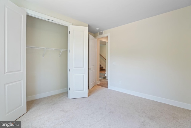 826 Long Meadow Dr, Fredericksburg, VA 22406 - unfurnished bedroom featuring carpet floors, baseboards, and a closet