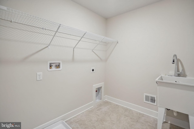 826 Long Meadow Dr, Fredericksburg, VA 22406 - washroom featuring electric dryer hookup, washer hookup, and baseboards