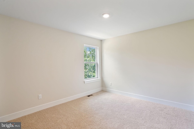 826 Long Meadow Dr, Fredericksburg, VA 22406 - spare room featuring baseboards and light carpet