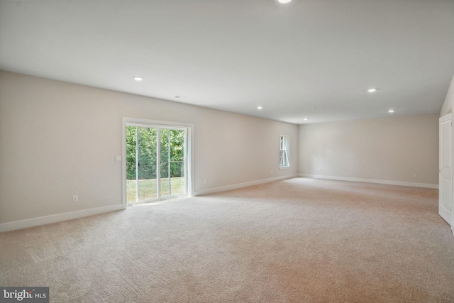 826 Long Meadow Dr, Fredericksburg, VA 22406 - empty room featuring healthy amount of natural light, light carpet, baseboards, and recessed lighting