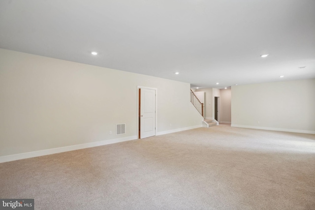 826 Long Meadow Dr, Fredericksburg, VA 22406 - below grade area with stairs, light carpet, recessed lighting, and baseboards