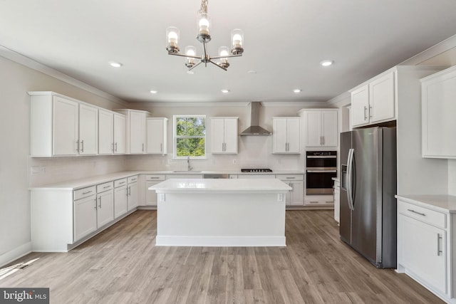 826 Long Meadow Dr, Fredericksburg, VA 22406 - kitchen featuring stainless steel fridge with ice dispenser, wall chimney exhaust hood, a sink, multiple ovens, and a center island
