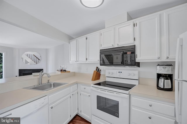 6190 Little Valley Way, Alexandria, VA 22310 - kitchen featuring white appliances, a sink, white cabinets, and light countertops