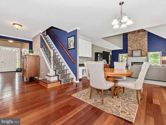 2619 Washington Way, Manchester, MD 21102 - dining room featuring a chandelier, stairs, hardwood / wood-style flooring, and a fireplace