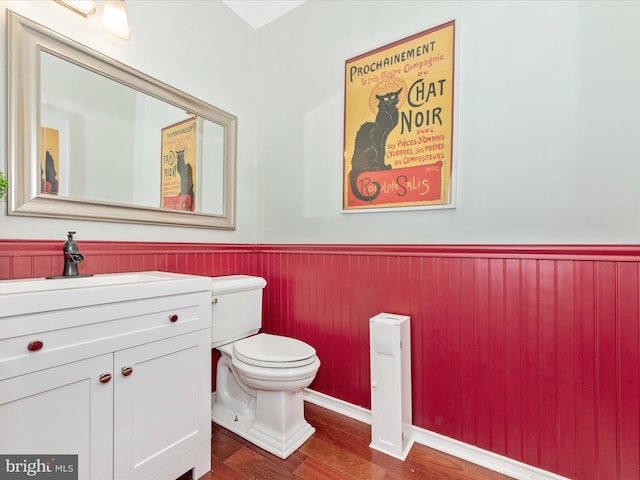 2619 Washington Way, Manchester, MD 21102 - bathroom with wainscoting, vanity, toilet, and wood finished floors