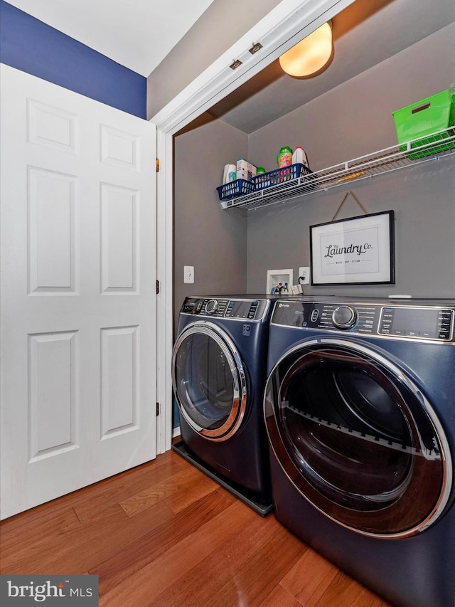 2619 Washington Way, Manchester, MD 21102 - laundry area featuring washer and clothes dryer and wood finished floors