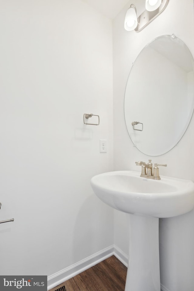 6 Little Way Unit 64, Hanover, PA 17331 - bathroom featuring baseboards, wood finished floors, and a sink