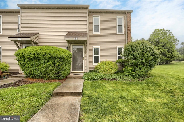 618 Mill Race Ct, Carlisle, PA 17013 - townhome / multi-family property with a front lawn