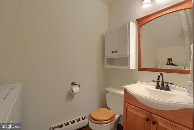 618 Mill Race Ct, Carlisle, PA 17013 - half bath with a baseboard radiator, toilet, and vanity