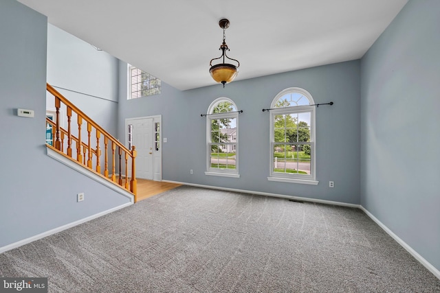 19 Pear Tree Pl, Sewell, NJ 08080 - carpeted foyer featuring healthy amount of natural light, stairs, and baseboards