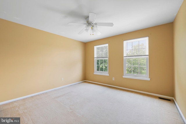 19 Pear Tree Pl, Sewell, NJ 08080 - unfurnished room featuring baseboards, light colored carpet, and a ceiling fan