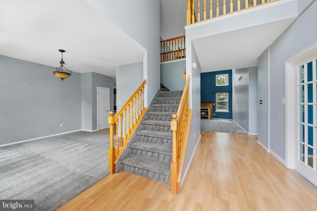 19 Pear Tree Pl, Sewell, NJ 08080 - stairway with wood finished floors, baseboards, and a towering ceiling