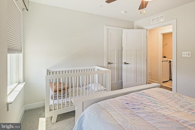 6023 Charles Henry Pl, Hanover, MD 21076 - carpeted bedroom with washer / dryer, baseboards, and ceiling fan
